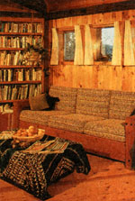 Much of the home's aesthetic warmth comes from the broad use of wood in the interior . . . And a small, but open, floor arrangement.